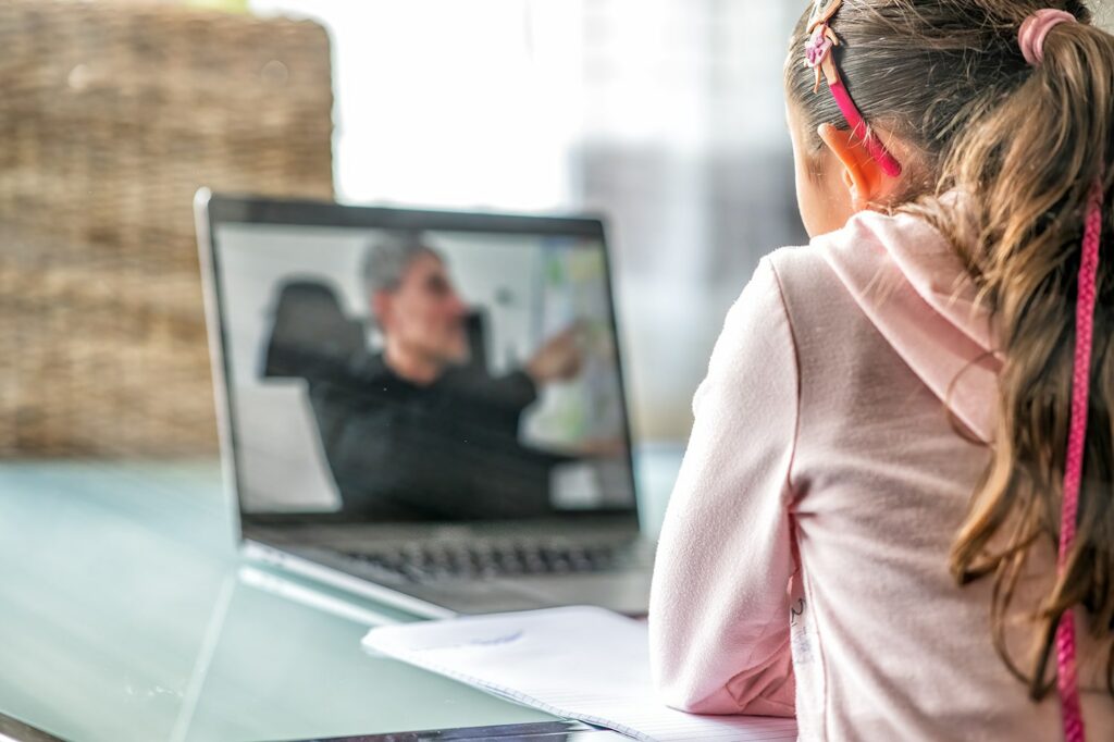 young girl watching a video