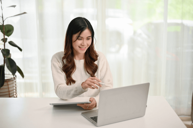 woman checking courses at the oed website