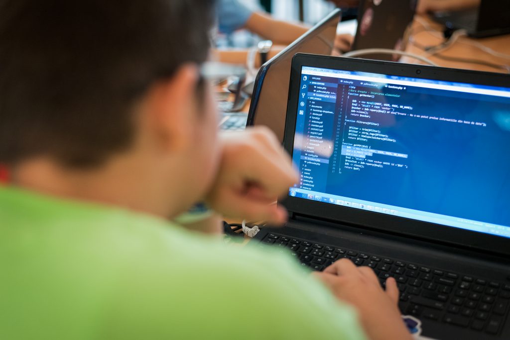 a male student studying computer science