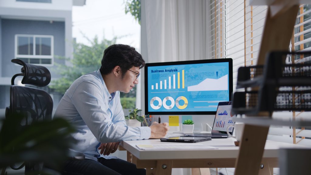 a data analyst looking at graphs