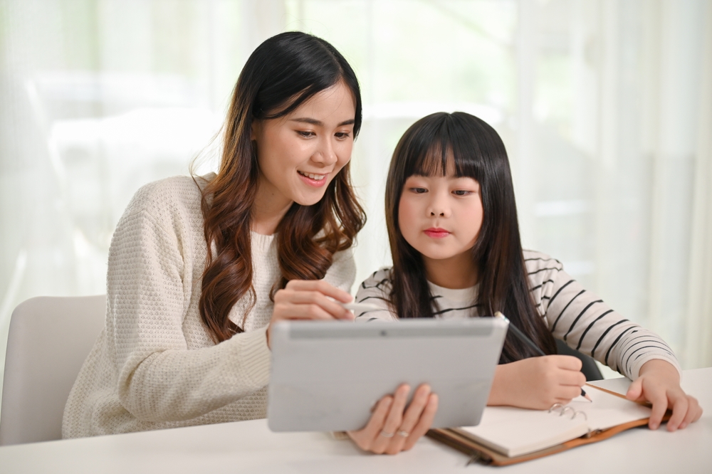 a tutor teaching her tutee